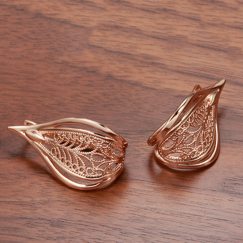 Fashionable Rose Gold Geometric Hollow Pattern Earrings