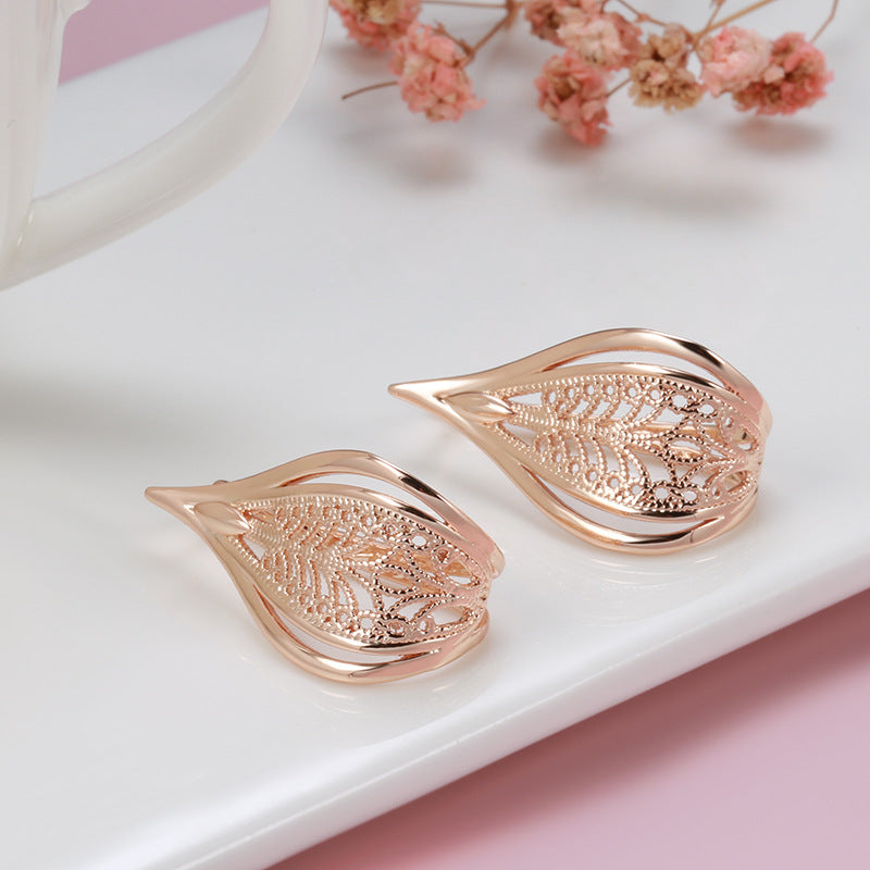 Fashionable Rose Gold Geometric Hollow Pattern Earrings